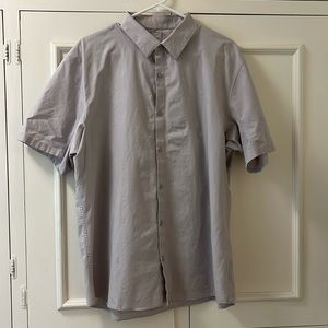 Men’s Lululemon polo ; grey with a hint of lavender coloring